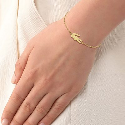 bracelet lacoste femme acier doré crocodile souple et fin