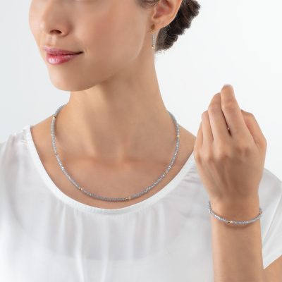 collier cœur de lionLittle Twinkle or-bleu glacé verre taillé gris bleu
