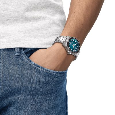 montre tissot seastar powermaric 80 40 mm homme acier et bleu turquoise bracelet acier cadran bleu turquoise lunette noire
