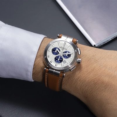 montre herbelin newport chrono homme acier et cuir marron compteurs bleu marine cadran argent blanc brossé quartz