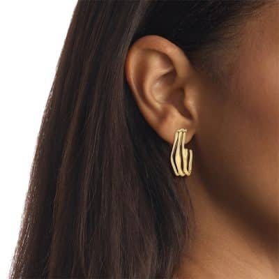 boucles d'oreilles Créoles Calvin Klein wavy sculptural en acier doré