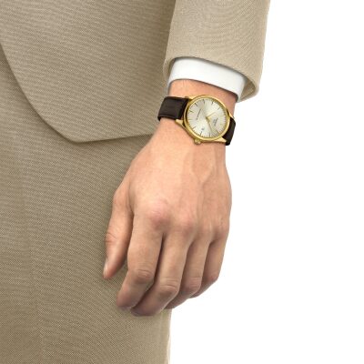 montre tissot classic dream acier doré 40 mm mouvement automatique powermatic 80 bracelet cuir noir