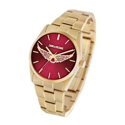 Montre Zadig et Voltaire femme en acier doré avec ailes dorées et cadran bordeaux. Boitier diamètre 36 mm. Quartz. Livraison gratuite. Expédition 24H.